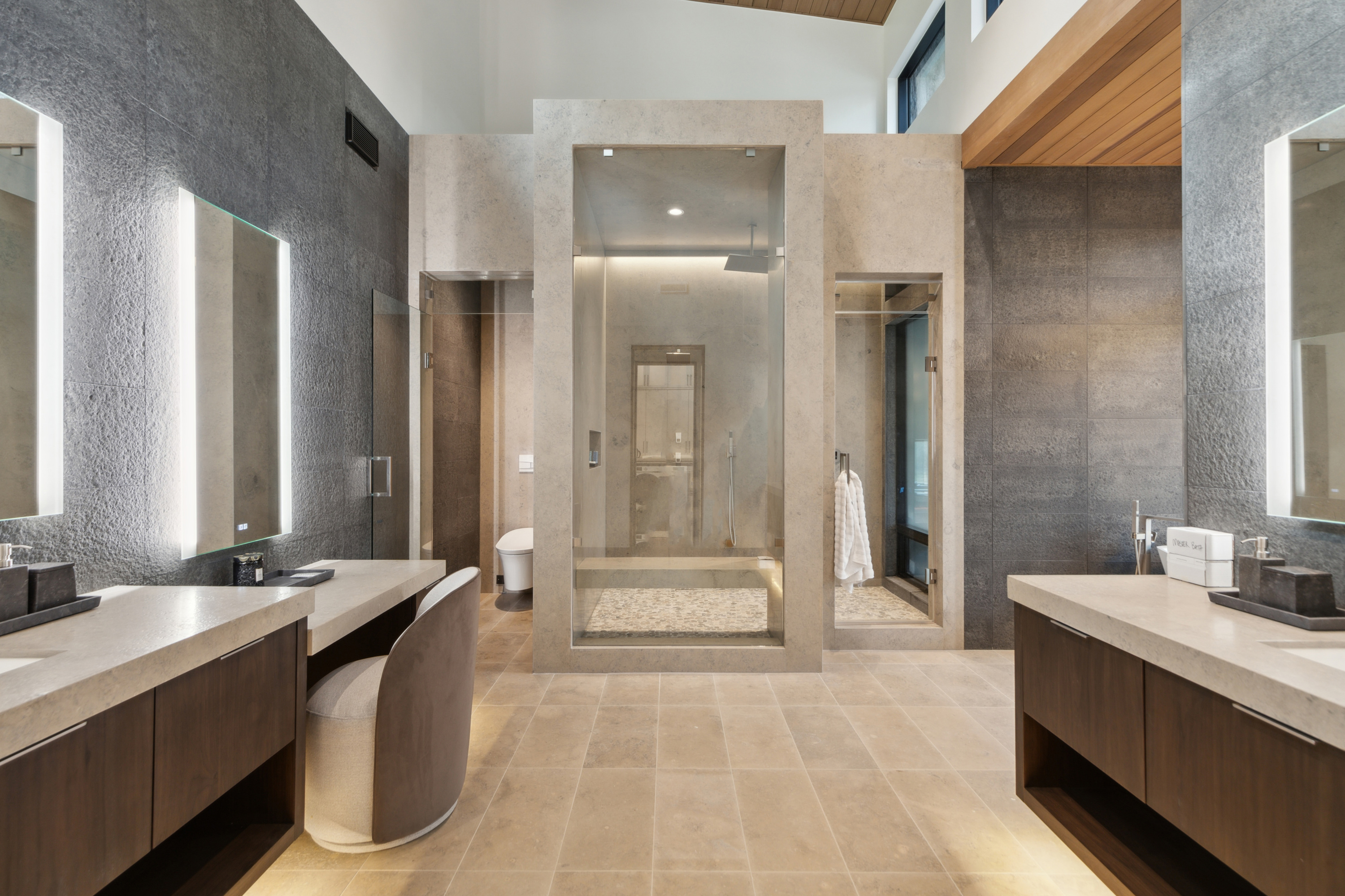 Luxury master bathroom with dual vanities and walk-in shower
